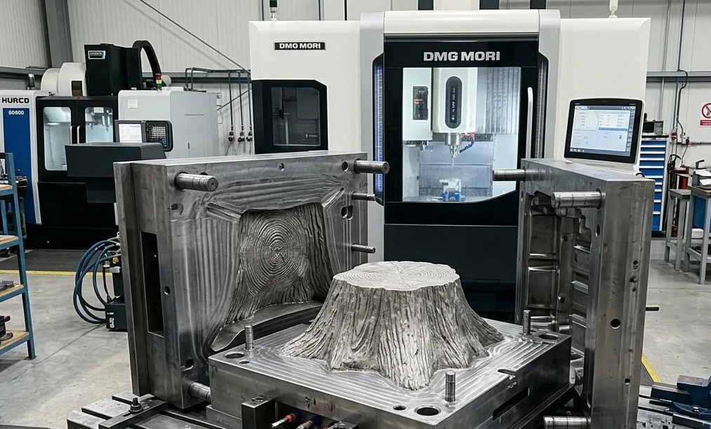 Injection mold manufacturing workshop with CNC machining and wood grain texture mold