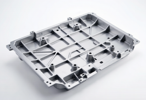 Integrated aluminum EV battery tray, vacuum high-pressure die cast structural component with internal ribs and mounting bosses