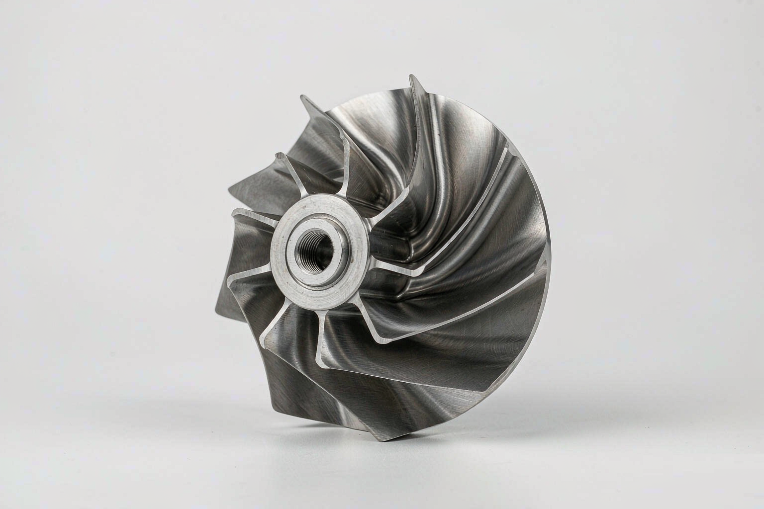 Complex 5-axis CNC machined impeller with curved blades