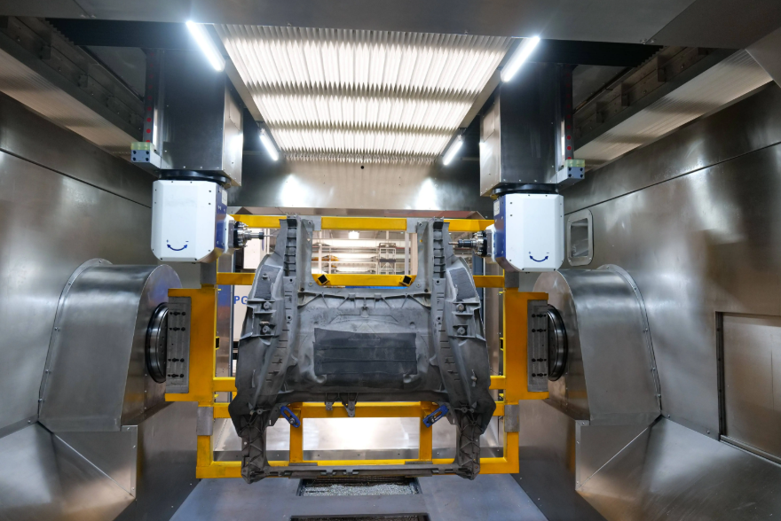 High-pressure die casting machine in a clean workshop producing aluminum automotive components