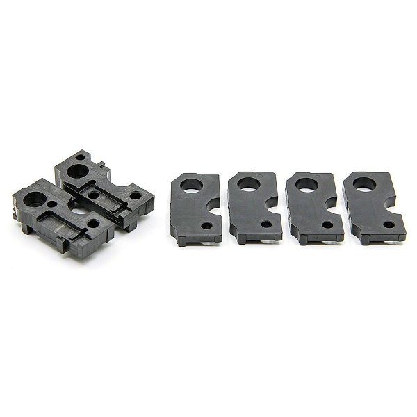 Comparison of a single CNC machined PEEK part versus a row of identical injection-molded PEEK parts