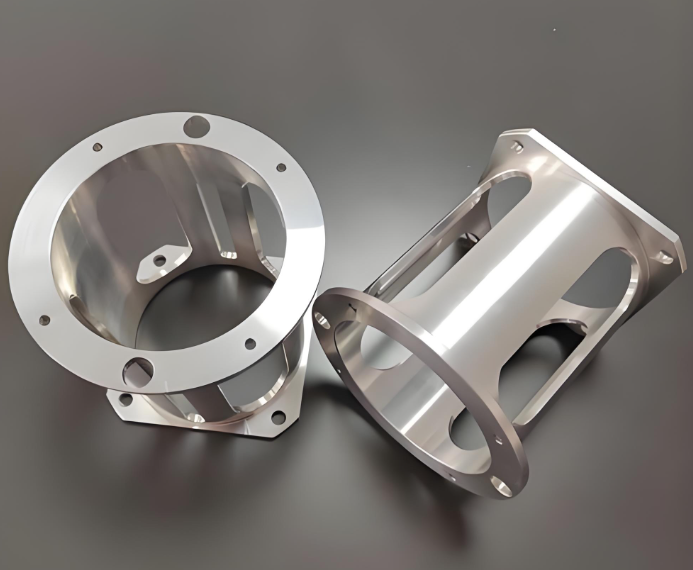Stainless steel and titanium CNC-machined brackets side by side