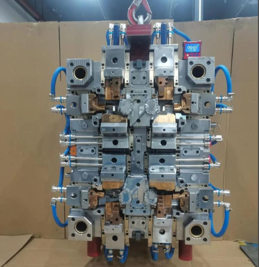 Injection mold being machined and assembled for a custom plastic part