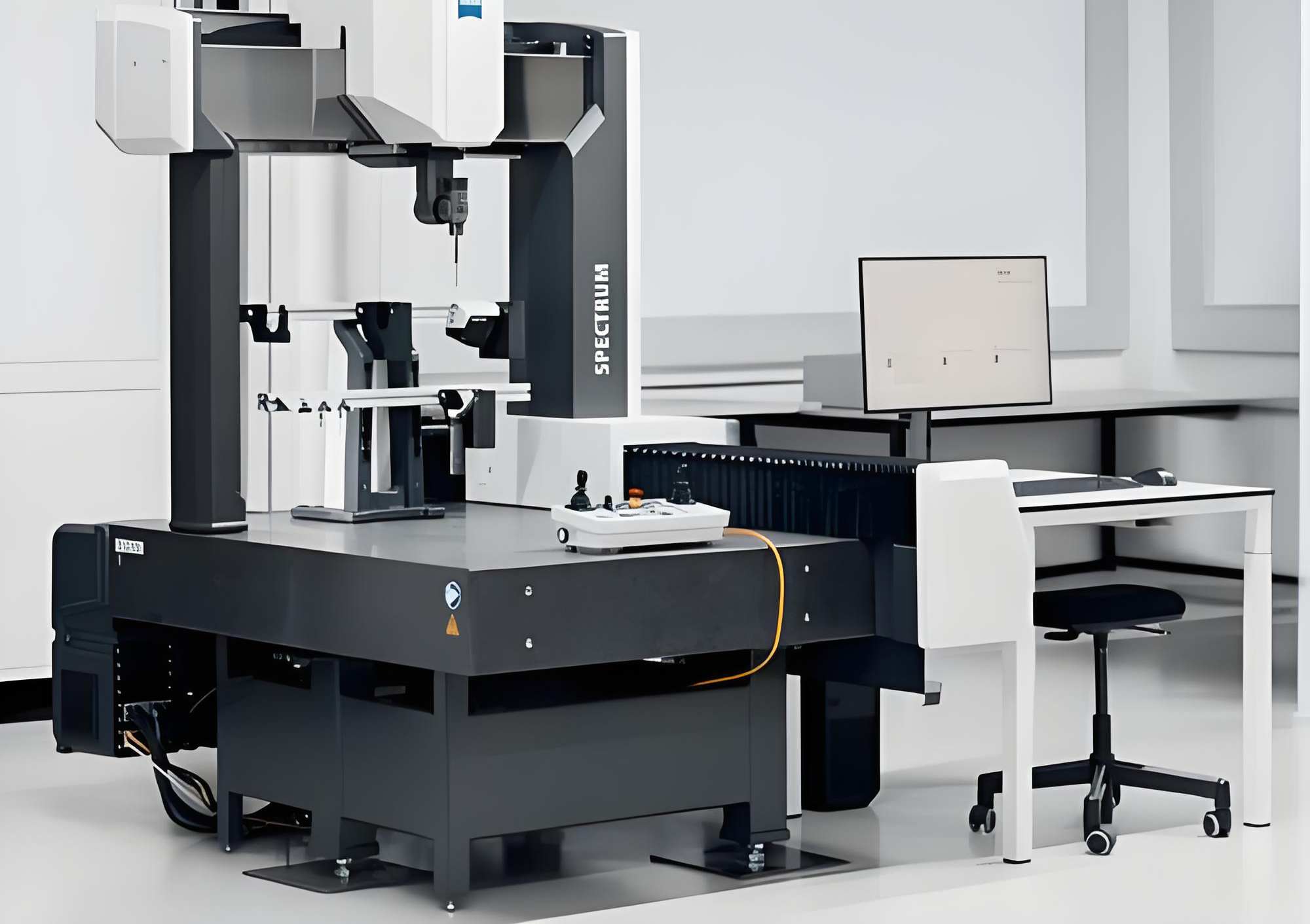 Coordinate measuring machine probing a precision machined metal aircraft bracket on a granite table