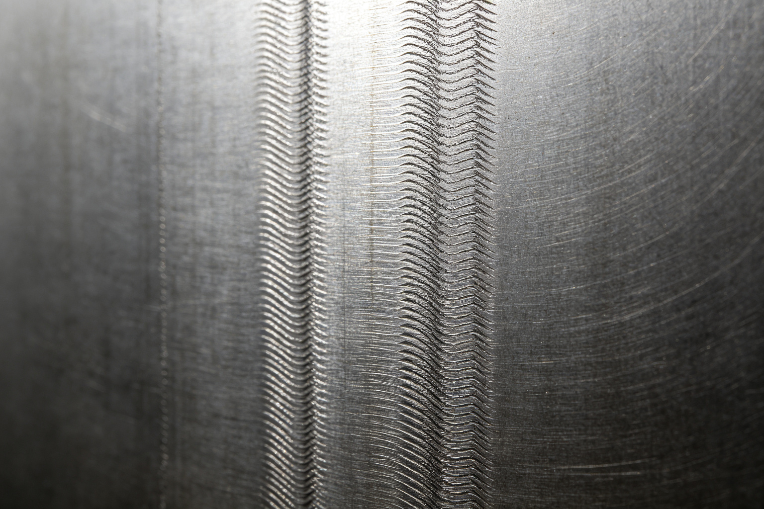 Machined steel wall showing visible chatter waviness marks