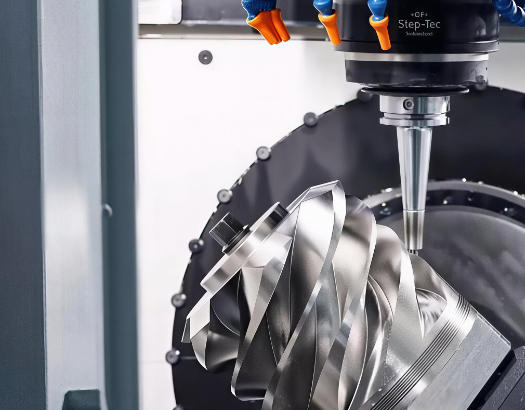 CNC machining center removing material from a metal workpiece