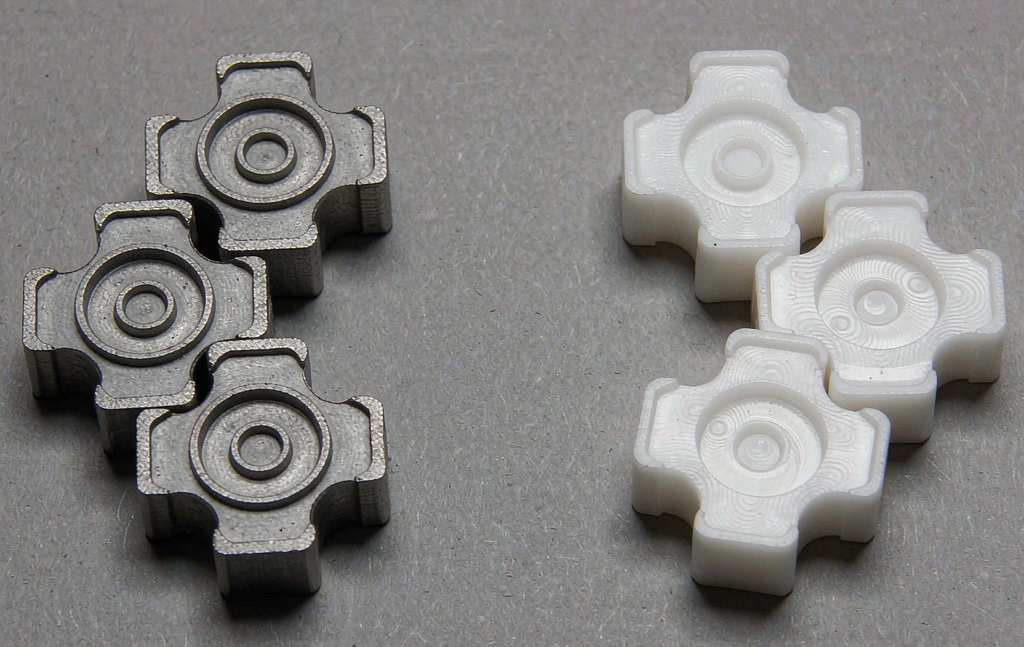 CNC machined prototype parts on the left and injection molded plastic parts on the right, side by side for comparison