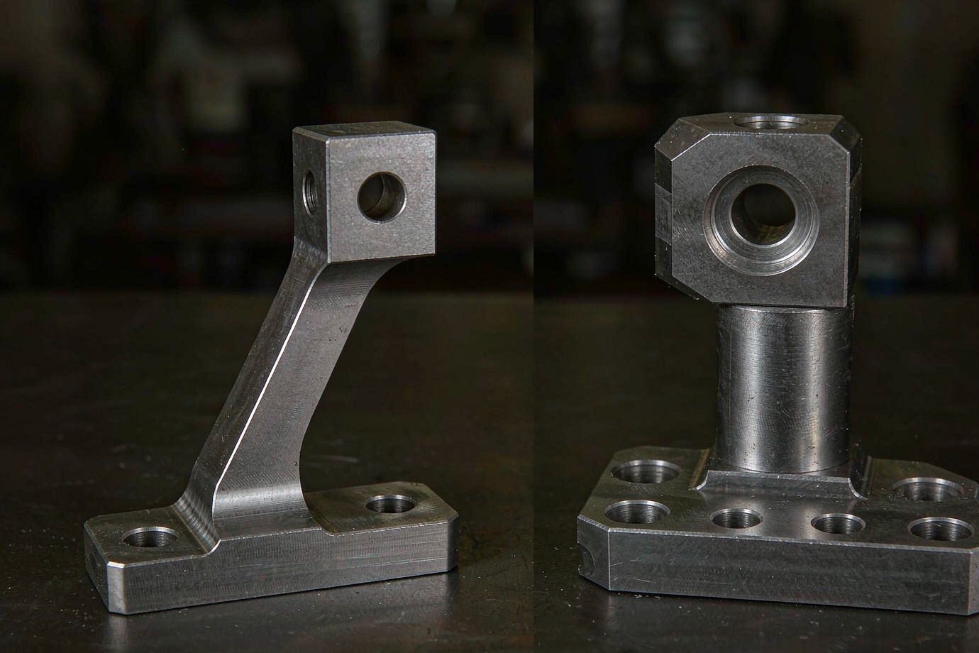 Two CNC machined brackets showing the original and DFM-optimised version
