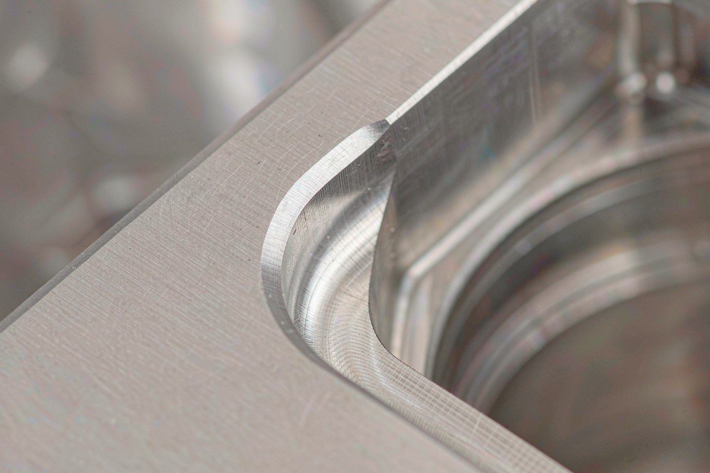 Close-up of a CNC machined aluminium part showing a functional internal corner radius