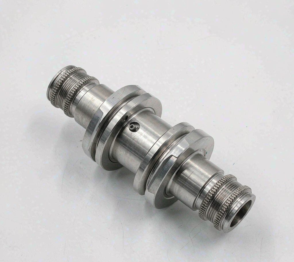 CNC turned stainless steel e-bike axle component with threaded ends and concentric surfaces