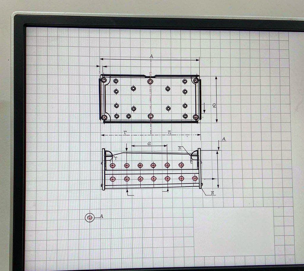 CAD dimension drawing of an e-bike bracket showing hole positions, tolerances and datums