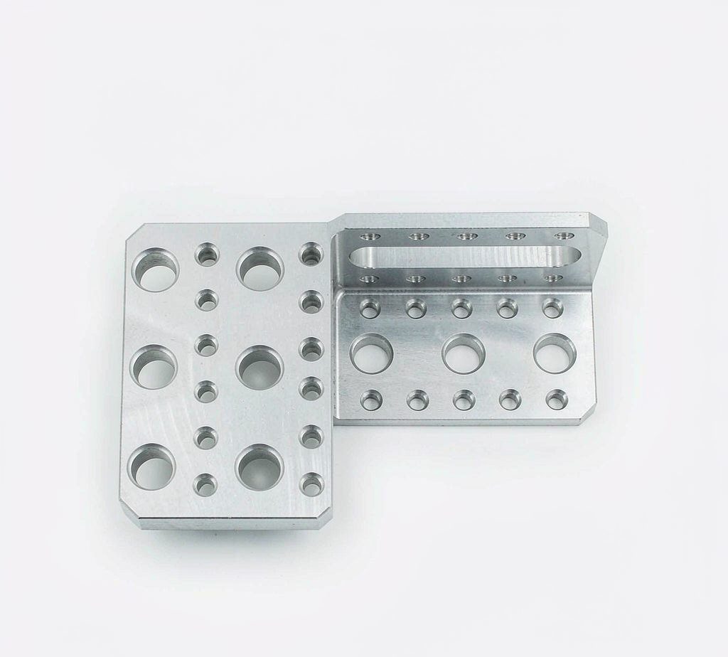 CNC machined aluminum structural bracket with drilled holes