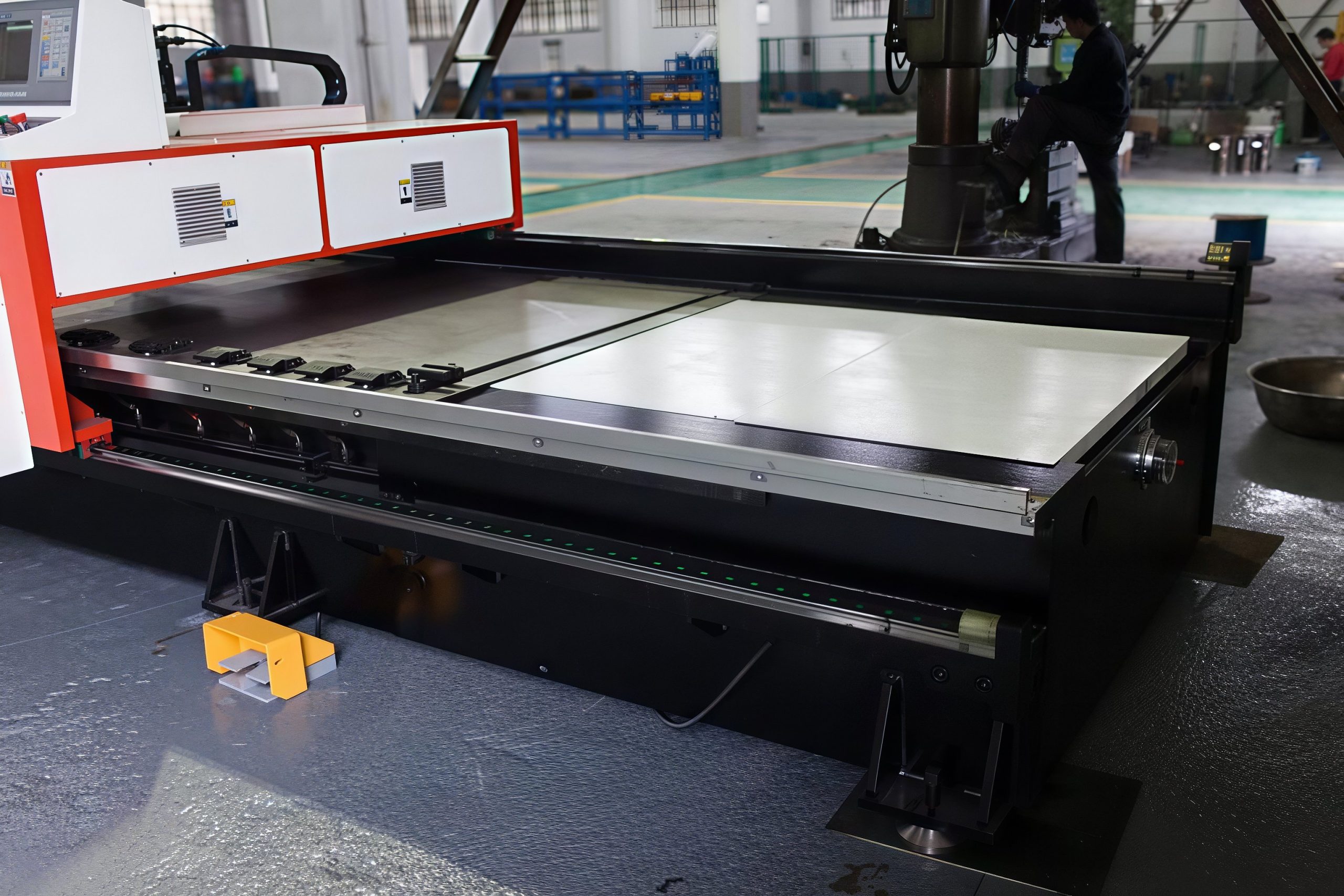 CNC router machining cable cutouts into a PVC enclosure sheet