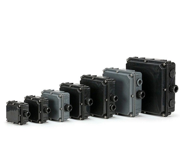 Row of black and grey IP68 junction boxes ranging from a small compact unit to a large enclosure