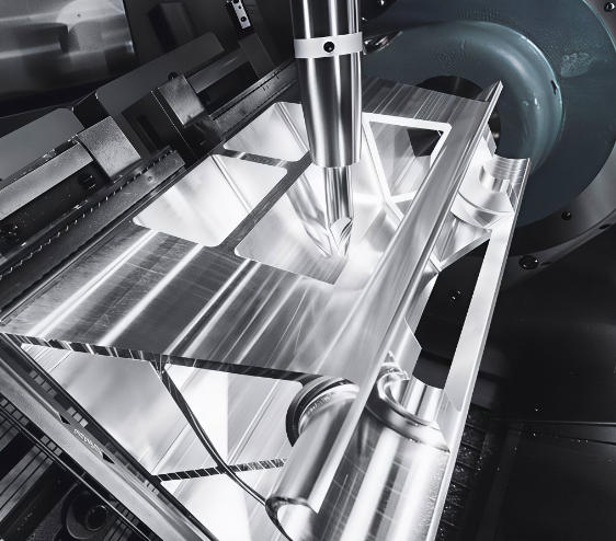 5-axis CNC machining center cutting a Ti-6Al-4V titanium component