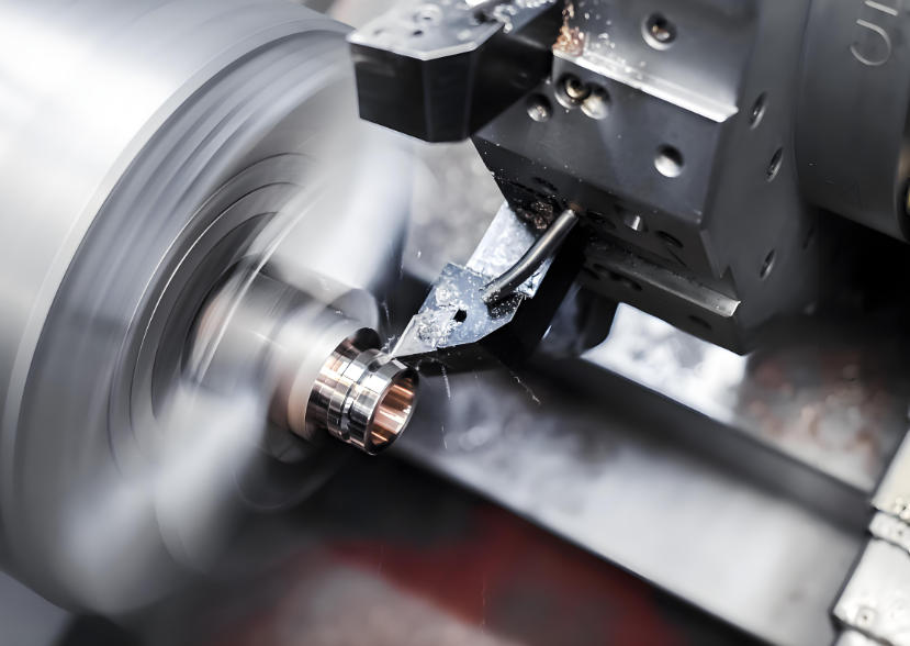 5-axis CNC machining center cutting a titanium component on a rotary table