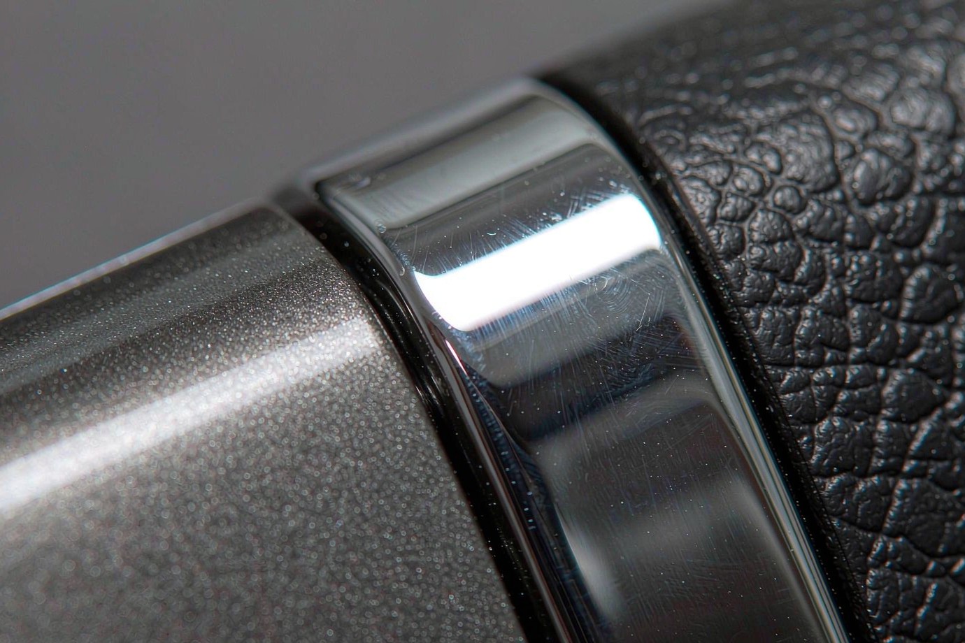 Illustrative close-up of molded plastic surface textures showing matte, gloss and fine texture
