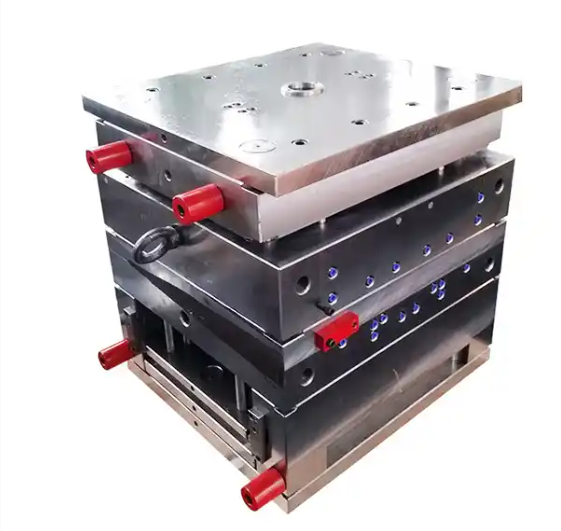 Injection mold base plate with machined core and cavity and an identification tag plate beside calipers