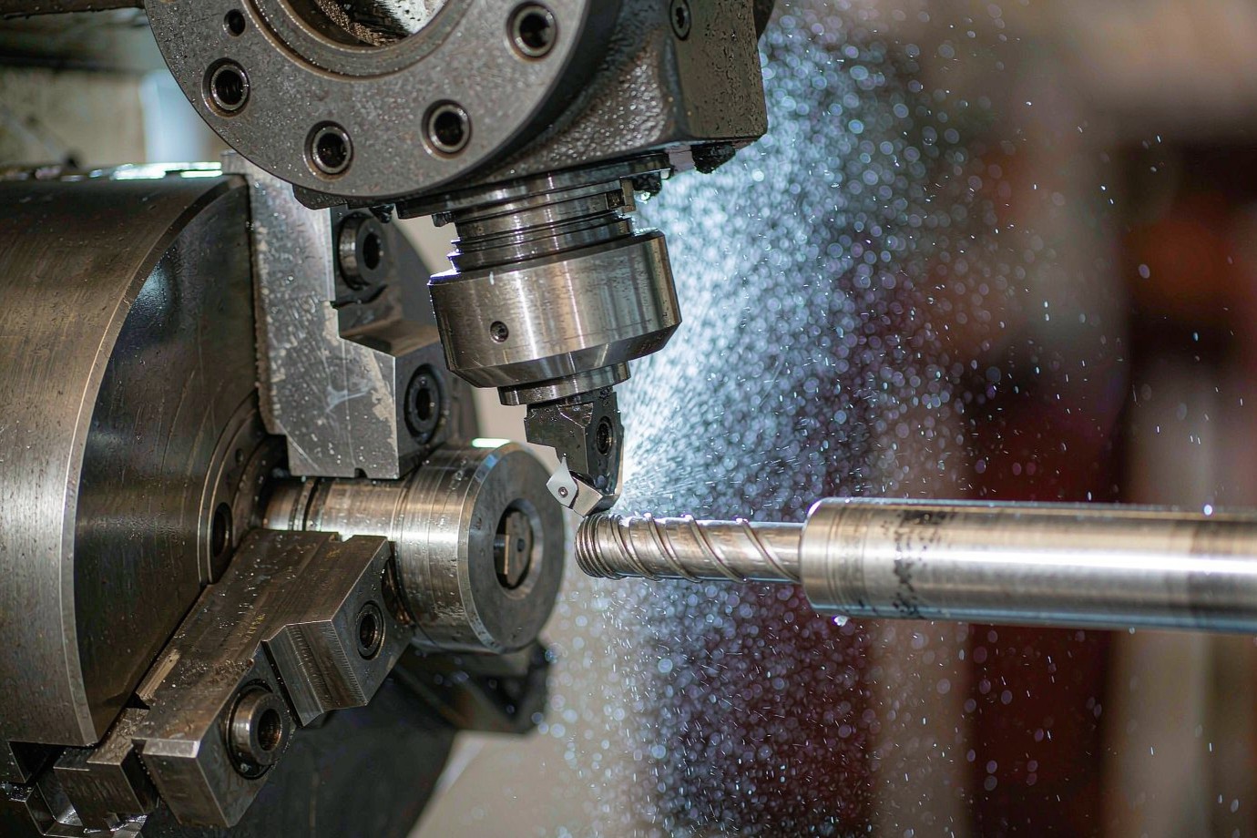 CNC turning center machining a metal shaft