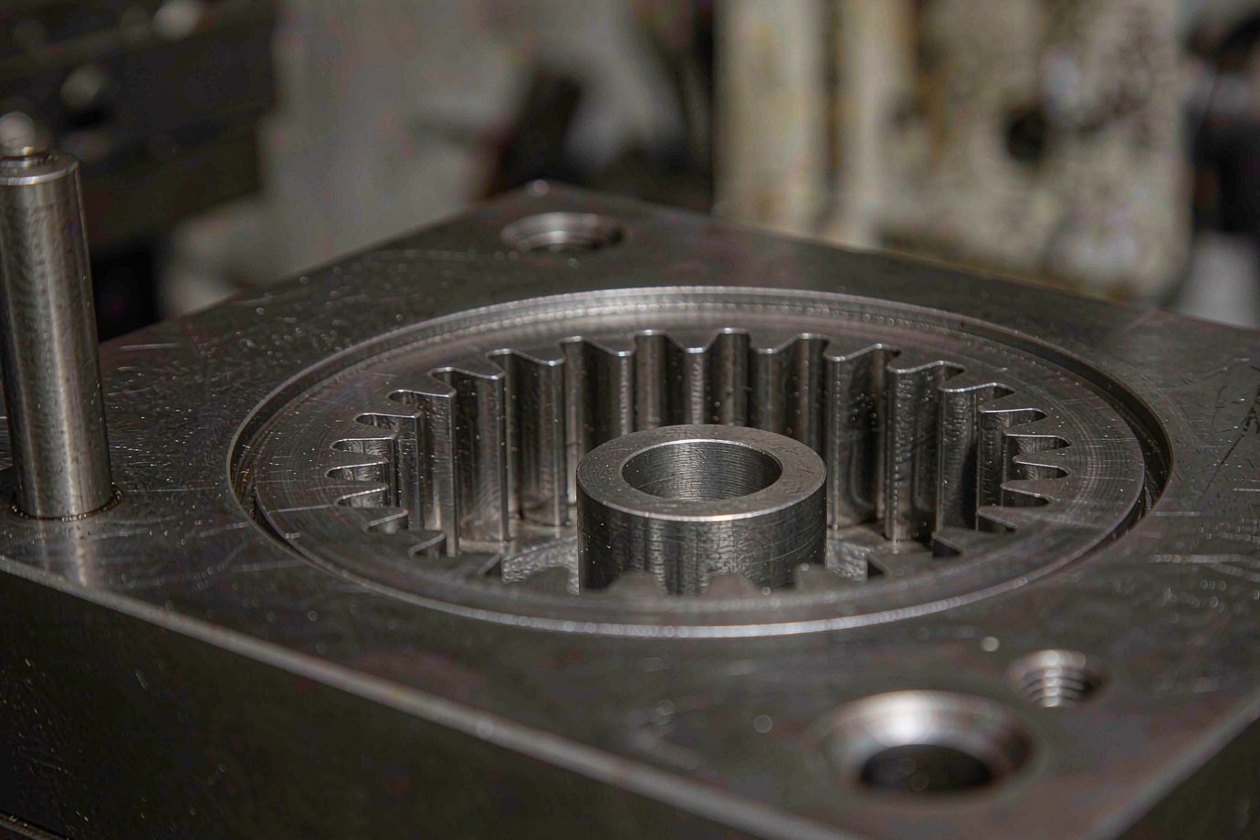 Steel injection mold cavity plate machined with a gear cavity, shown as a tooling reference (Illustrative)