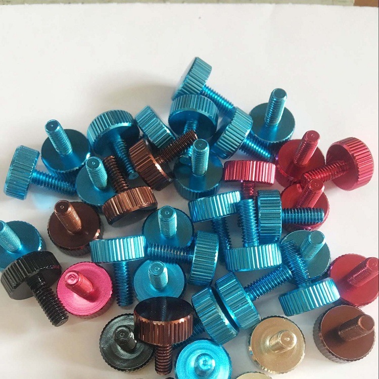 Multiple colored anodized aluminum components