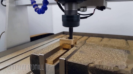 CNC milling machine working on brass part