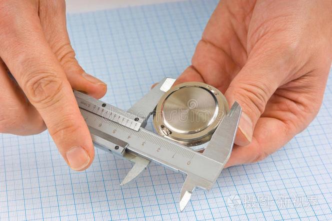 Quality control dimensional inspection with caliper measurement on stamped metal parts