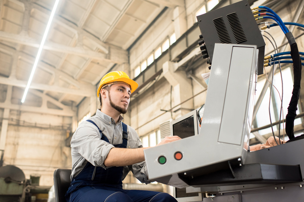 CNC Machine Operator at Work
