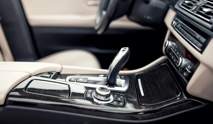 Automotive interior plastic injection molded parts including center console components