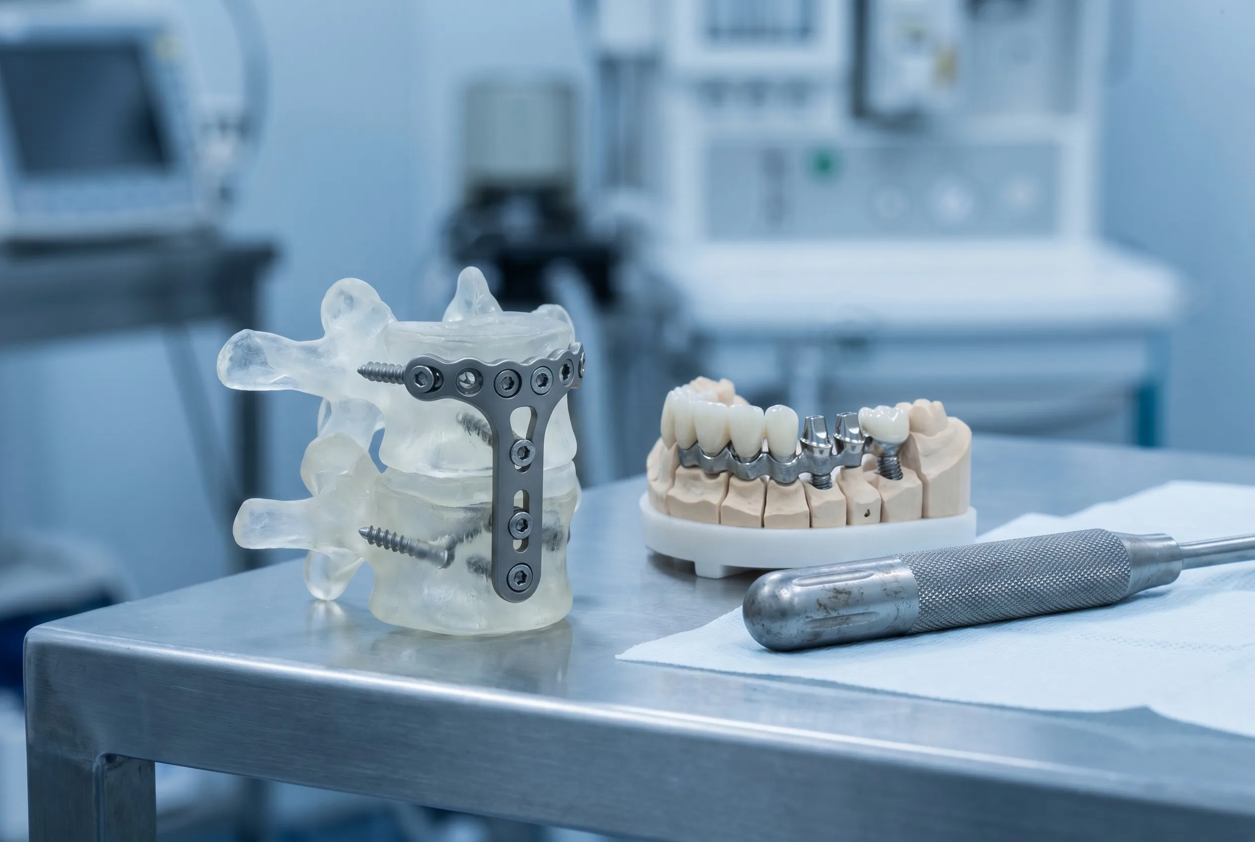 Titanium medical implant components in real application contexts: spine plate, dental framework, and surgical instrument handle