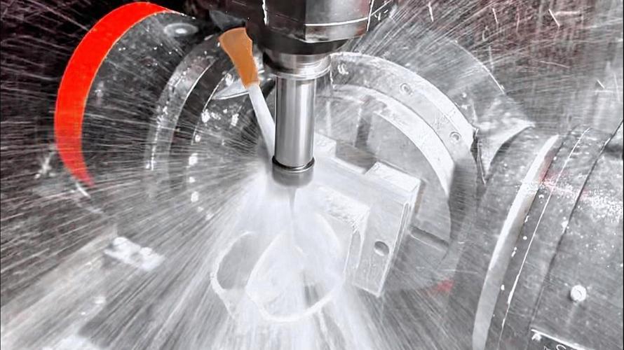 5-axis CNC milling machine cutting a metal aerospace part