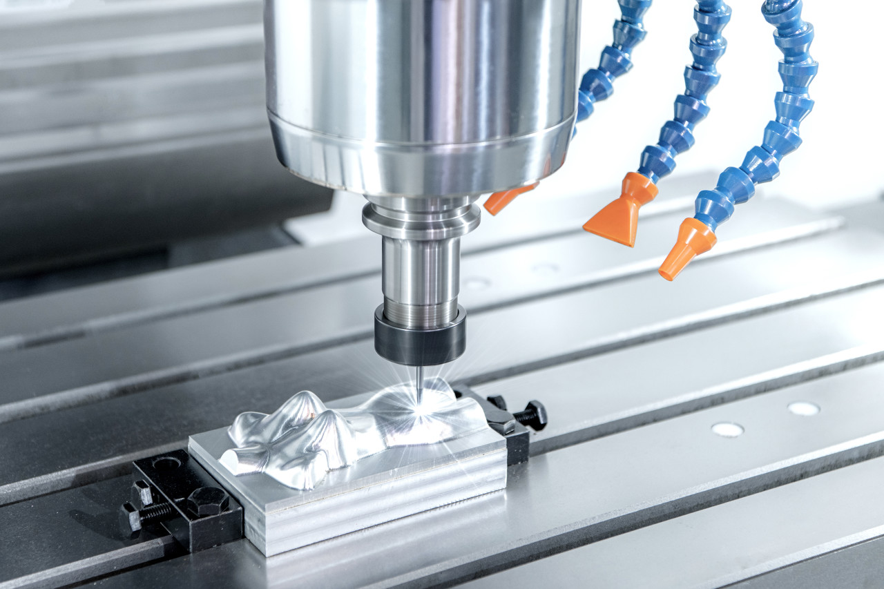 CNC machine processing motorcycle part