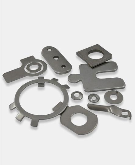 What is the difference between CNC and stamping?