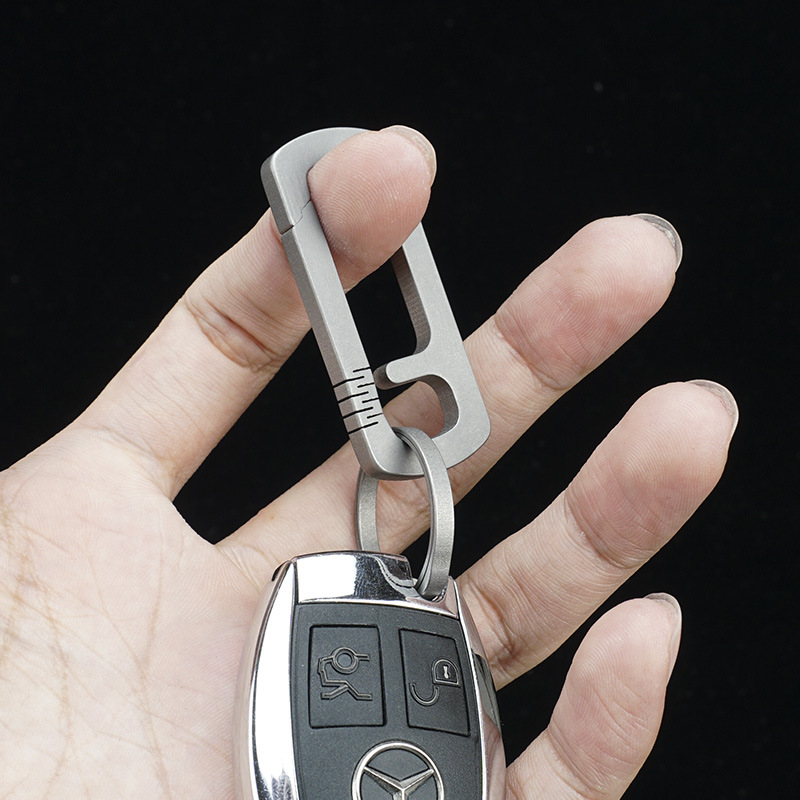 CNC machined aluminum key fob case with car key