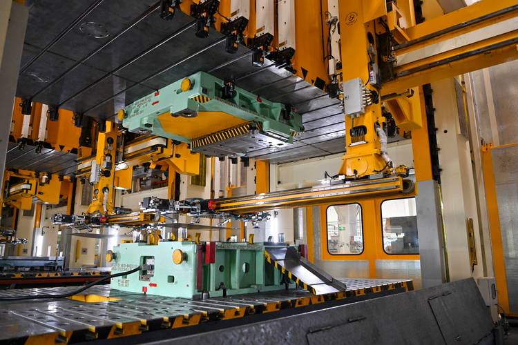 Modern stamping and CNC workshop with advanced machinery