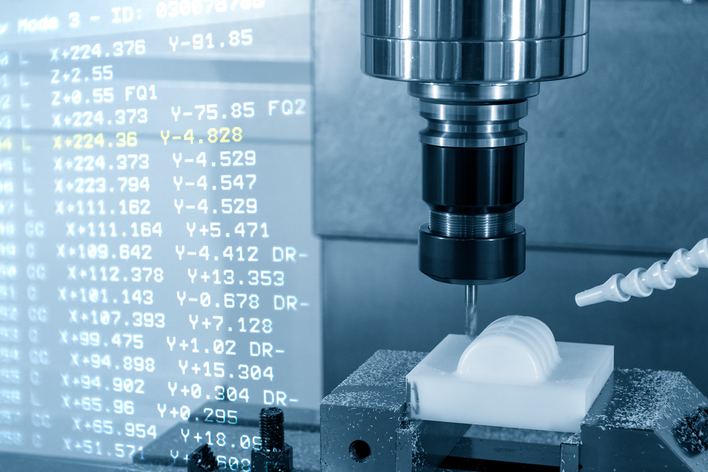 CNC Machining of Plastic Materials with G-code Data Display