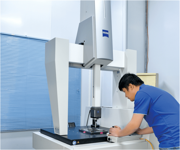 Engineer reviewing Teflon part design