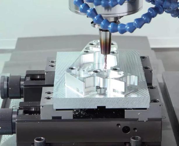 What is the difference between CNC and machining?