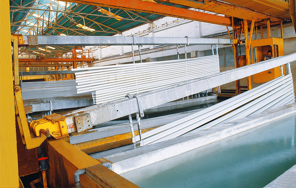 Industrial anodizing line with aluminum parts