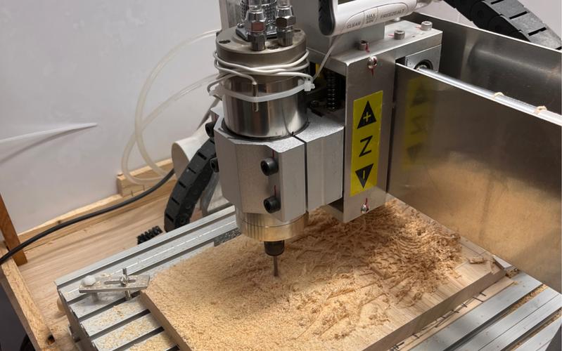 CNC Machine Working on Walnut Wood