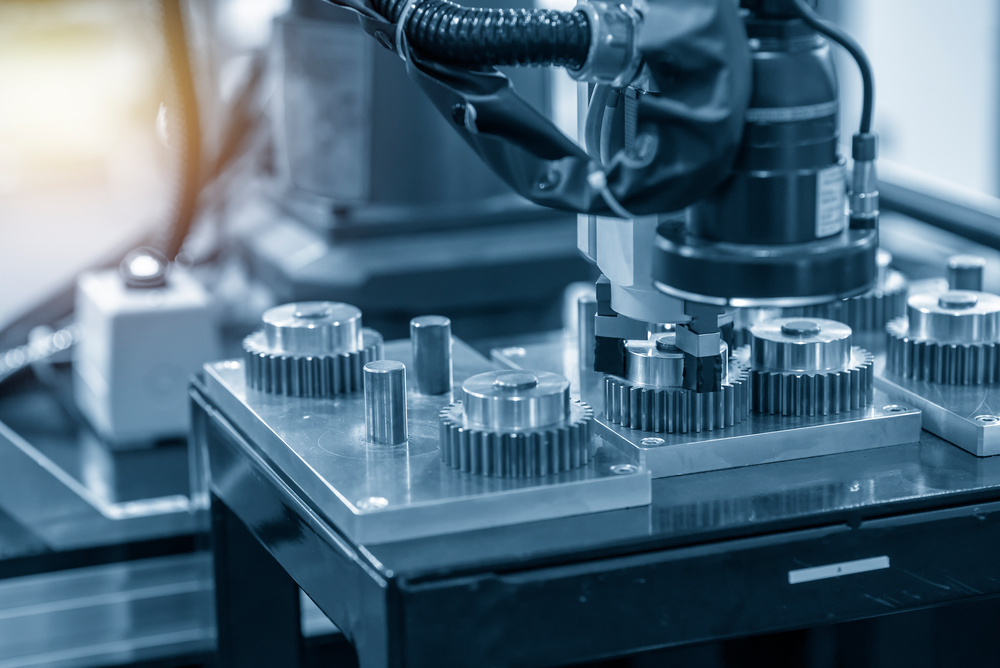 Robotic arm in gear manufacturing showing precision machining