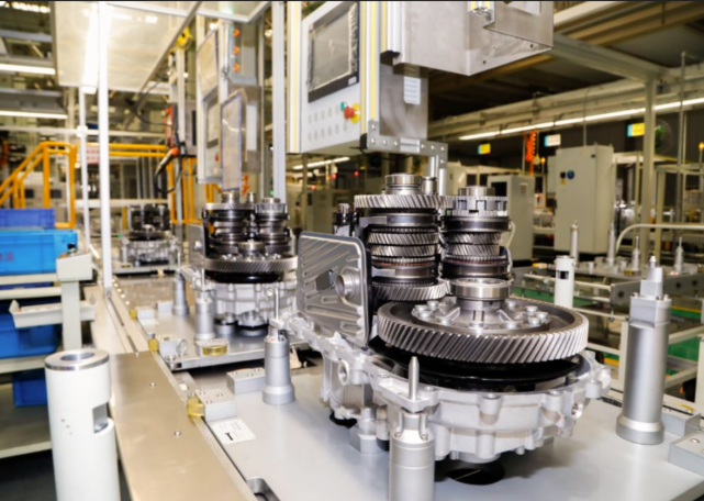 Engine gears on production line showing precision manufacturing